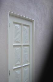 Finished concrete stucco patch painted to match