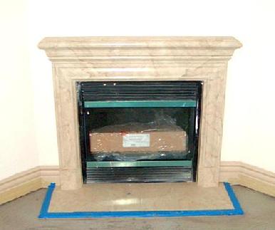 One of 38 fireplaces painted to look like marble in a West Los Angeles condo building
